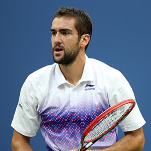 NEW YORK, NY - SEPTEMBER 11:  Marin Cilic of Croatia looks on against Novak Djokovic of Serbia during their Men's Singles Semifinals match on Day Twelve of the 2015 US Open at the USTA Billie Jean King National Tennis Center on September 11, 2015 in the Flushing neighborhood of the Queens borough of New York City.  (Photo by Matthew Stockman/Getty Images)